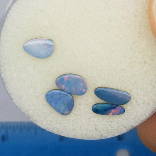 Opal doublet cabochons showing play-of-color